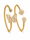 twisted cuff Gold with butterfly charm